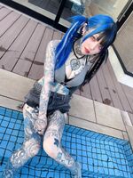 Can a woman "actually have a tattoo w" marry →?